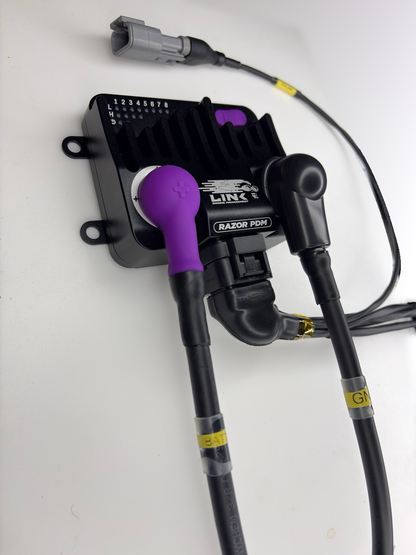 Custom VTI Link Razor PDM loom example showing the PDM, battery leads and molded connector boot