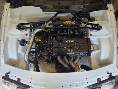 Honda engine bay with a VTI Motorsports Link G4X engine harness installation