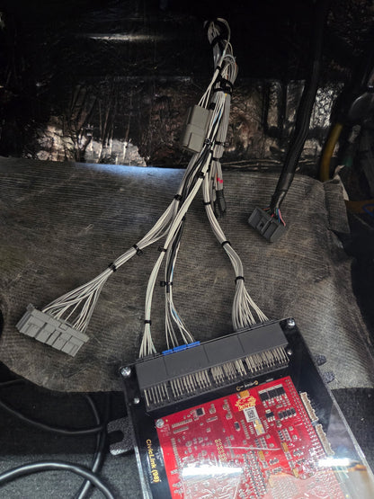 VTI Motorsports Honda OBD2A engine harness connected to an open Link ECU during assembly